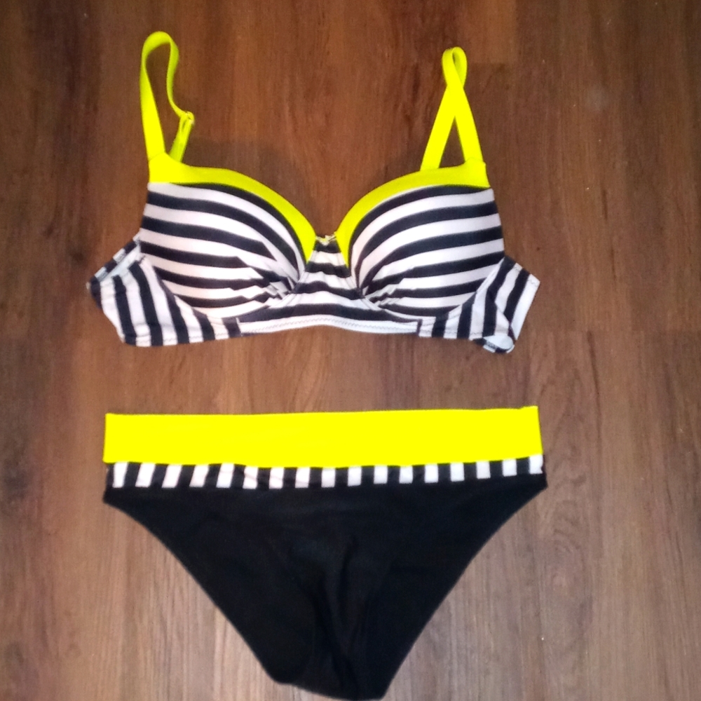 Two piece bikini. Black white and neon yellow. Bottoms size L, Top size xxl